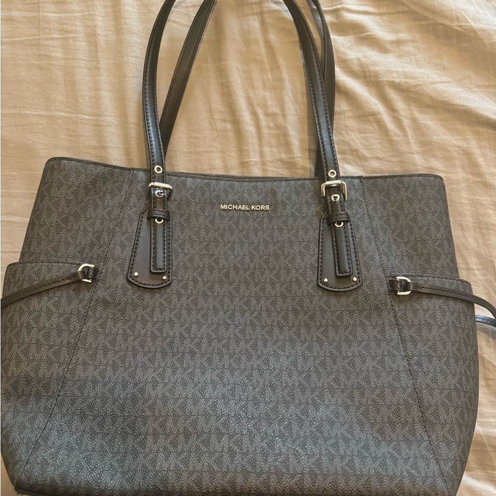 Micheal Kors purse. Gently used black and grey